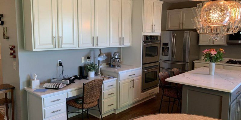 white painted kitchen cabinets, different color kitchen island in Cleveland