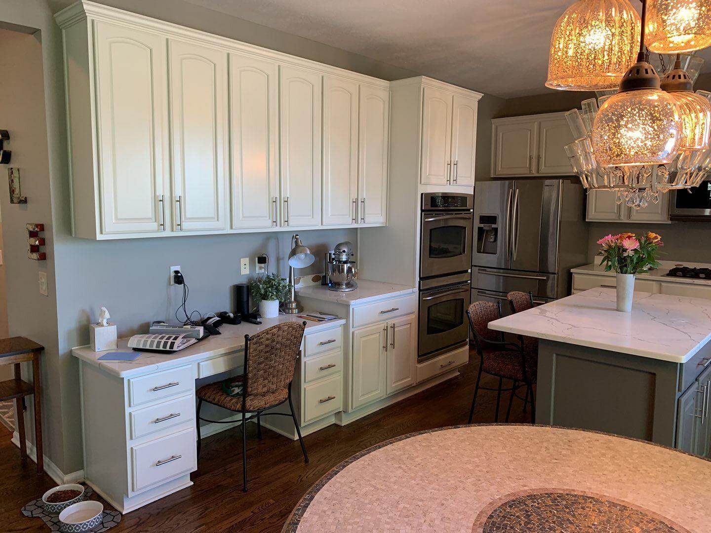 white painted kitchen cabinets, different color kitchen island in Cleveland